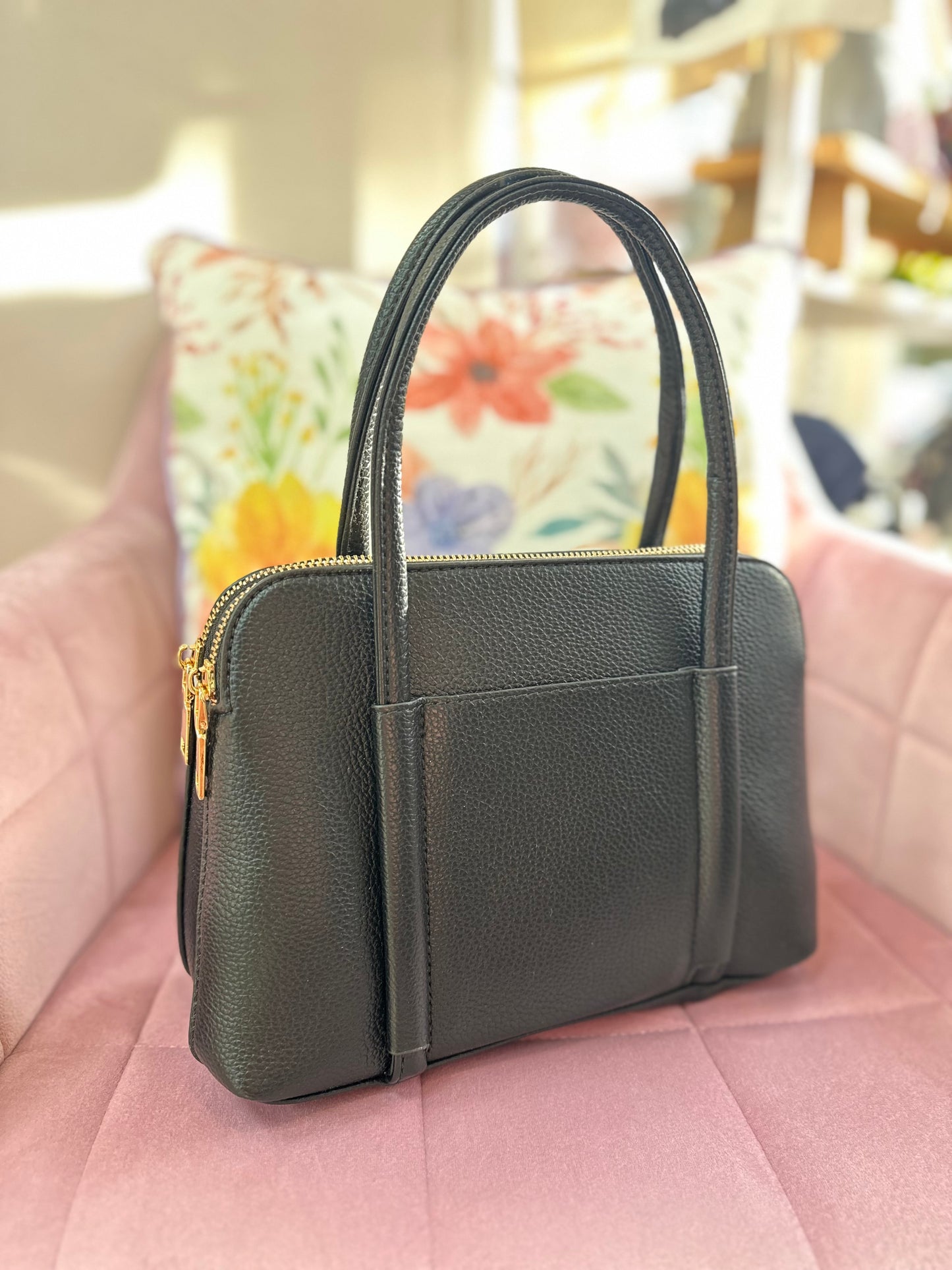 Bolso negro bolsillos