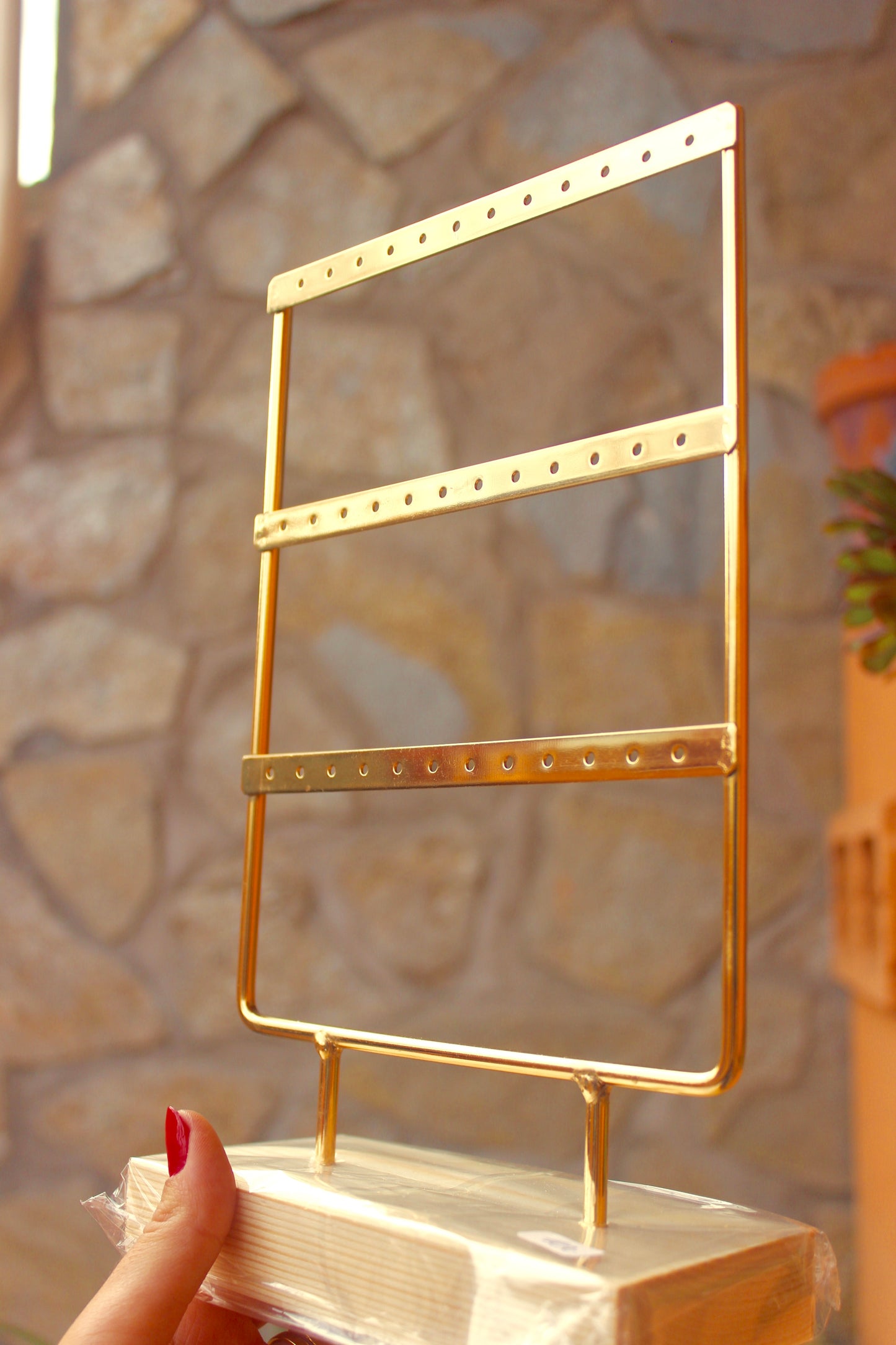 Expositor pendientes dorado