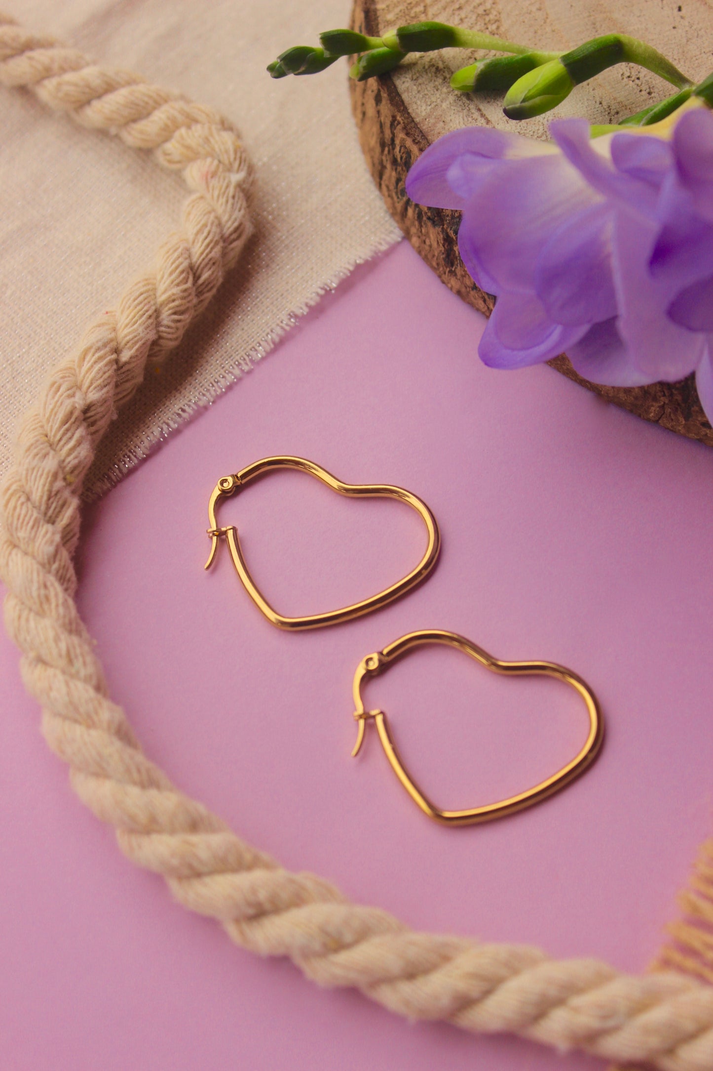 Pendientes corazón dorados y plateados