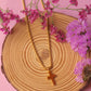 Collar cruz dorada