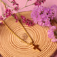 Collar cruz dorada